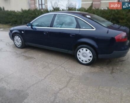 Синий Ауди А6, объемом двигателя 1.9 л и пробегом 300 тыс. км за 1600 $, фото 1 на Automoto.ua