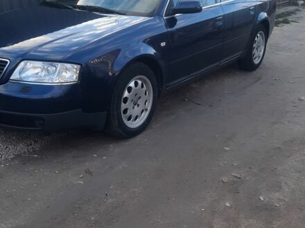 Синий Ауди А6, объемом двигателя 2 л и пробегом 326 тыс. км за 4650 $, фото 1 на Automoto.ua