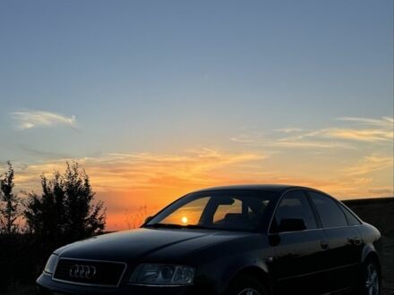 Синий Ауди А6, объемом двигателя 2.4 л и пробегом 380 тыс. км за 5000 $, фото 1 на Automoto.ua