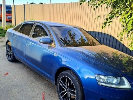 Синий Ауди А6, объемом двигателя 2.4 л и пробегом 314 тыс. км за 7000 $, фото 1 на Automoto.ua