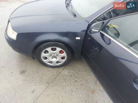 Синий Ауди А6, объемом двигателя 2.5 л и пробегом 252 тыс. км за 4000 $, фото 1 на Automoto.ua