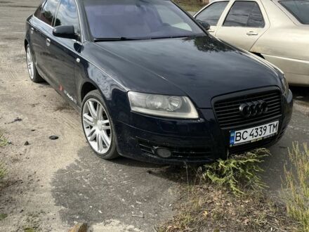 Синий Ауди А6, объемом двигателя 2.4 л и пробегом 370 тыс. км за 6100 $, фото 1 на Automoto.ua
