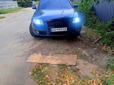 Синий Ауди А6, объемом двигателя 2.4 л и пробегом 314 тыс. км за 7000 $, фото 1 на Automoto.ua