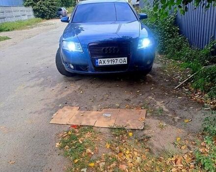 Синий Ауди А6, объемом двигателя 2.4 л и пробегом 314 тыс. км за 7000 $, фото 1 на Automoto.ua