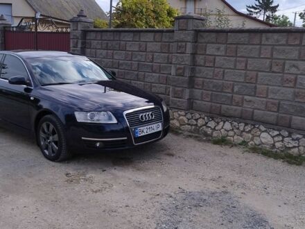 Синій Ауді А6, об'ємом двигуна 2.4 л та пробігом 240 тис. км за 6800 $, фото 1 на Automoto.ua