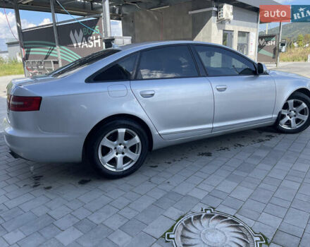 Синій Ауді А6, об'ємом двигуна 2 л та пробігом 325 тис. км за 9300 $, фото 1 на Automoto.ua