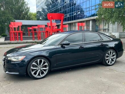 Синій Ауді А6, об'ємом двигуна 2 л та пробігом 128 тис. км за 14999 $, фото 1 на Automoto.ua