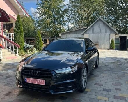 Синий Ауди А6, объемом двигателя 2 л и пробегом 250 тыс. км за 15500 $, фото 1 на Automoto.ua