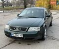 Зеленый Ауди А6, объемом двигателя 1.78 л и пробегом 234 тыс. км за 4500 $, фото 1 на Automoto.ua