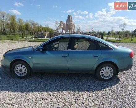 Зеленый Ауди А6, объемом двигателя 1.78 л и пробегом 275 тыс. км за 4400 $, фото 1 на Automoto.ua