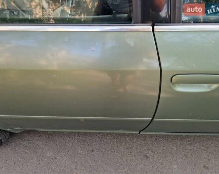 Зеленый Ауди А6, объемом двигателя 2.5 л и пробегом 319 тыс. км за 4200 $, фото 1 на Automoto.ua