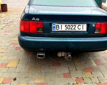 Зеленый Ауди А6, объемом двигателя 2.6 л и пробегом 270 тыс. км за 3000 $, фото 1 на Automoto.ua