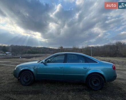 Зеленый Ауди А6, объемом двигателя 2.39 л и пробегом 325 тыс. км за 3700 $, фото 1 на Automoto.ua