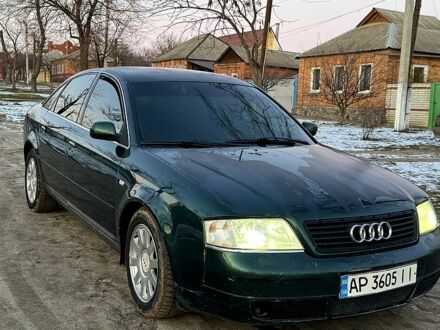 Ауди А6 1997 в Харькове на Automoto.ua Зеленый Ауди А6, объемом двигателя 2.4 л и пробегом 400 тыс. км за 2200 $, фото 1 на Automoto.ua