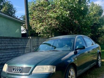 Зеленый Ауди А6, объемом двигателя 1.8 л и пробегом 350 тыс. км за 1900 $, фото 1 на Automoto.ua