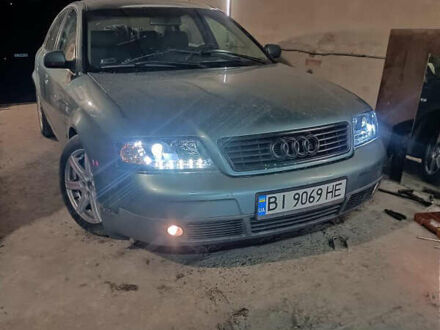 Зеленый Ауди А6, объемом двигателя 1.78 л и пробегом 387 тыс. км за 1200 $, фото 1 на Automoto.ua