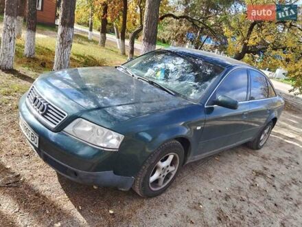 Зеленый Ауди А6, объемом двигателя 2.4 л и пробегом 321 тыс. км за 4500 $, фото 1 на Automoto.ua