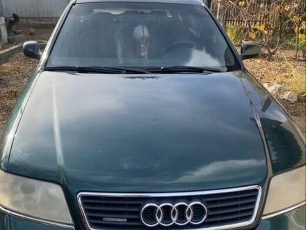 Зеленый Ауди А6, объемом двигателя 2.5 л и пробегом 321 тыс. км за 1500 $, фото 1 на Automoto.ua