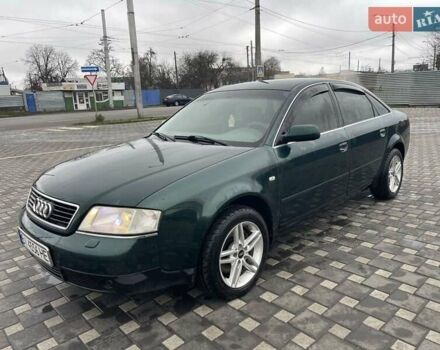 Зеленый Ауди А6, объемом двигателя 2.39 л и пробегом 300 тыс. км за 3500 $, фото 1 на Automoto.ua