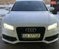 Белый Ауди A7 Sportback, объемом двигателя 3 л и пробегом 250 тыс. км за 6800 $, фото 1 на Automoto.ua