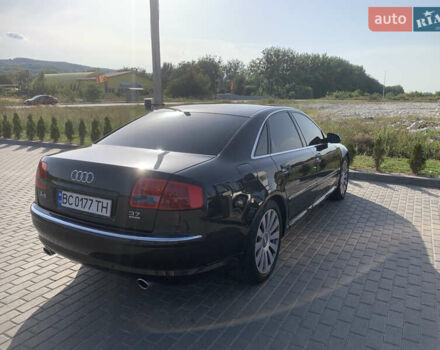 Черный Ауди А8, объемом двигателя 3.7 л и пробегом 330 тыс. км за 6500 $, фото 8 на Automoto.ua