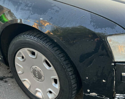 Черный Ауди А8, объемом двигателя 2.98 л и пробегом 336 тыс. км за 6000 $, фото 2 на Automoto.ua