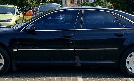 Черный Ауди А8, объемом двигателя 3 л и пробегом 123 тыс. км за 11000 $, фото 1 на Automoto.ua