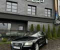 Черный Ауди А8, объемом двигателя 3 л и пробегом 270 тыс. км за 9300 $, фото 1 на Automoto.ua