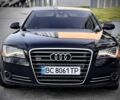 Черный Ауди А8, объемом двигателя 3 л и пробегом 240 тыс. км за 22500 $, фото 1 на Automoto.ua