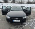 Черный Ауди А8, объемом двигателя 3 л и пробегом 200 тыс. км за 18000 $, фото 1 на Automoto.ua