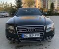 Черный Ауди А8, объемом двигателя 3 л и пробегом 210 тыс. км за 27000 $, фото 1 на Automoto.ua