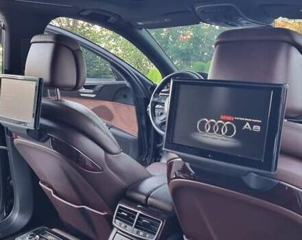 Ауді A8 2014 у Кривому Розі на Automoto.ua Чорний Ауді A8, об'ємом двигуна 3 л та пробігом 245 тис. км за 19000 $, фото 68 на Automoto.ua