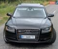 Черный Ауди А8, объемом двигателя 3 л и пробегом 114 тыс. км за 23700 $, фото 1 на Automoto.ua