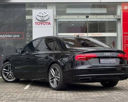 Чорний Ауді A8, об'ємом двигуна 3 л та пробігом 218 тис. км за 19485 $, фото 1 на Automoto.ua