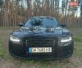 Черный Ауди А8, объемом двигателя 3 л и пробегом 190 тыс. км за 22000 $, фото 1 на Automoto.ua