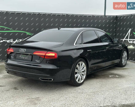 Черный Ауди А8, объемом двигателя 3 л и пробегом 170 тыс. км за 24999 $, фото 1 на Automoto.ua