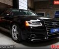 Черный Ауди А8, объемом двигателя 3 л и пробегом 79 тыс. км за 23999 $, фото 1 на Automoto.ua