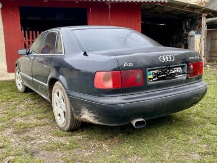 Черный Ауди А8, объемом двигателя 2.5 л и пробегом 329 тыс. км за 5500 $, фото 1 на Automoto.ua