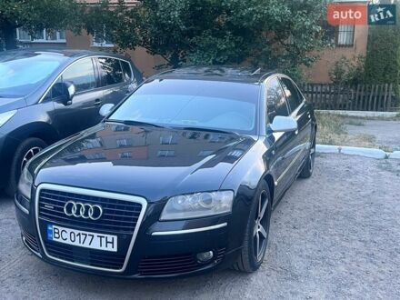 Черный Ауди А8, объемом двигателя 3.7 л и пробегом 335 тыс. км за 6000 $, фото 1 на Automoto.ua