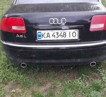Черный Ауди А8, объемом двигателя 2.98 л и пробегом 260 тыс. км за 2700 $, фото 1 на Automoto.ua