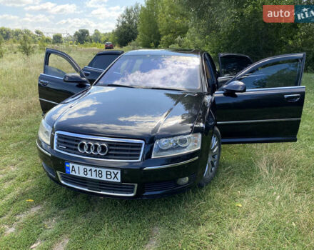 Черный Ауди А8, объемом двигателя 3 л и пробегом 238 тыс. км за 7500 $, фото 1 на Automoto.ua