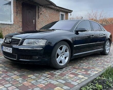Черный Ауди А8, объемом двигателя 3.9 л и пробегом 337 тыс. км за 7700 $, фото 1 на Automoto.ua
