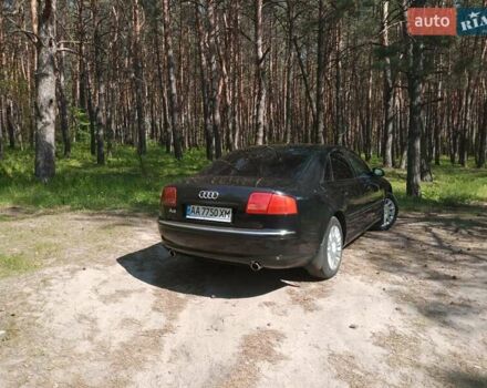 Черный Ауди А8, объемом двигателя 3.2 л и пробегом 310 тыс. км за 9300 $, фото 1 на Automoto.ua