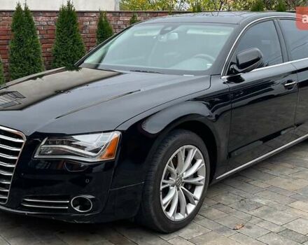 Черный Ауди А8, объемом двигателя 3 л и пробегом 318 тыс. км за 23700 $, фото 1 на Automoto.ua