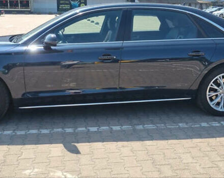 Черный Ауди А8, объемом двигателя 2.97 л и пробегом 230 тыс. км за 22100 $, фото 1 на Automoto.ua