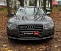 Серый Ауди А8, объемом двигателя 3 л и пробегом 233 тыс. км за 30990 $, фото 1 на Automoto.ua