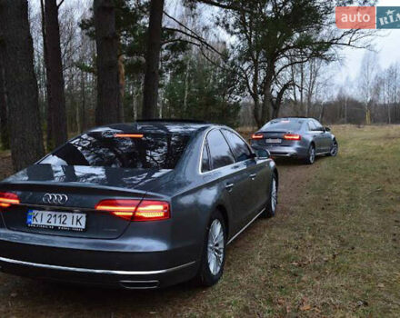 Сірий Ауді A8, об'ємом двигуна 3 л та пробігом 233 тис. км за 31900 $, фото 1 на Automoto.ua