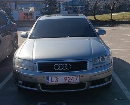 Серый Ауди А8, объемом двигателя 4 л и пробегом 370 тыс. км за 5100 $, фото 1 на Automoto.ua