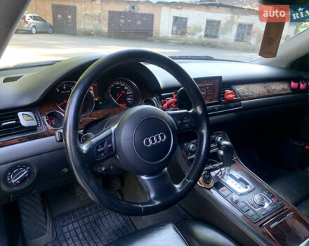Синий Ауди А8, объемом двигателя 4.2 л и пробегом 366 тыс. км за 7800 $, фото 19 на Automoto.ua