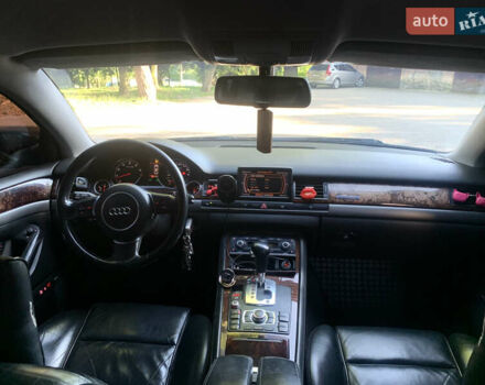 Синий Ауди А8, объемом двигателя 4.2 л и пробегом 366 тыс. км за 7800 $, фото 39 на Automoto.ua